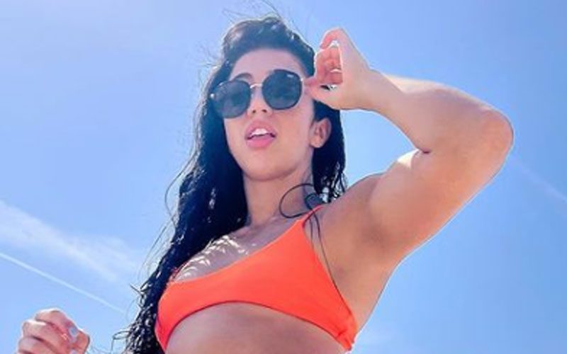 Indi Hartwell Sizzles In Cheeky Orange Oceanside Bikini Photo Drop