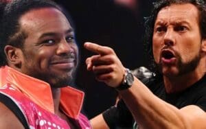 Xavier Woods Trolls Kenny Omega with CM Punk GIF