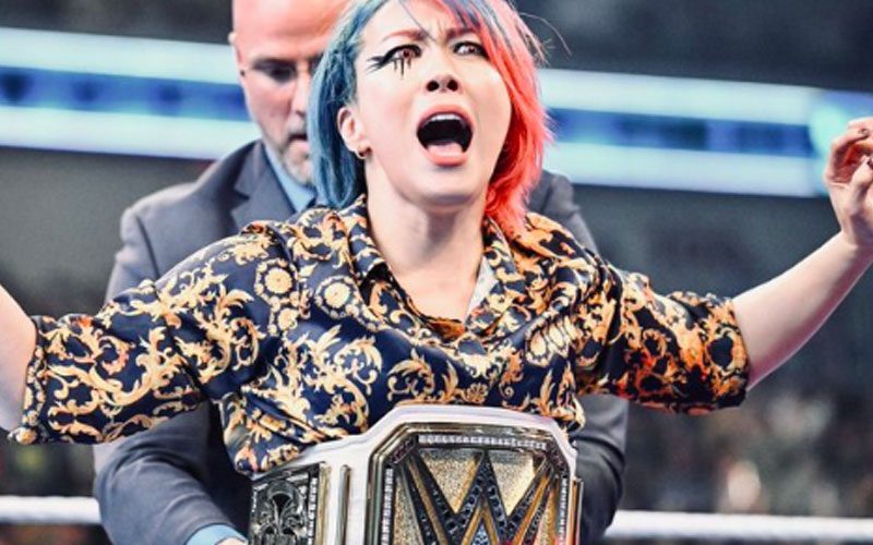 Asuka Defends New WWE Women’s Title Belt Design