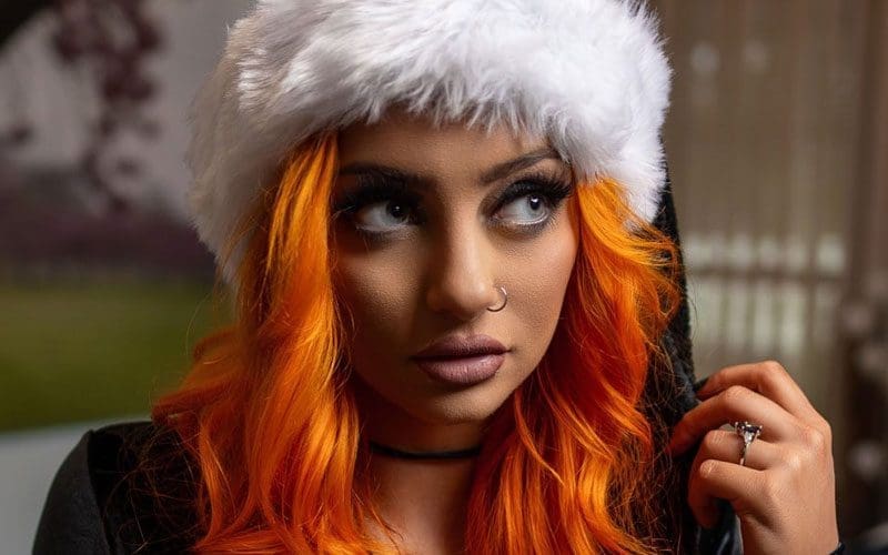 Gigi Dolin Unveils Festive Black Lingerie Photos to Spread Christmas