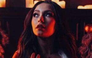 Skye Blue Embraces the Holiday Spirit with Smoldering Santa Photo
