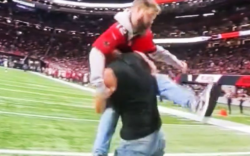 WWE Icon Goldberg Unleashes His Signature Spear on Tom Brady Supporter During Falcons Game