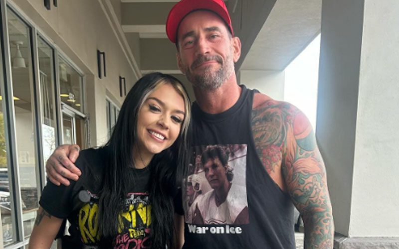 CM Punk Links Up with Cora Jade After ACL Surgery