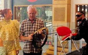 Becky Lynch Stops Seth Rollins from Attacking Man from Behind with a Chair