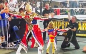 Cody Rhodes Does Entrance Pose with Young Fan at WWE Live Event