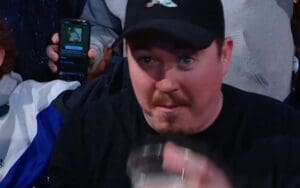 Shane Gillis Chugs a Beer at Ringside During WWE SmackDown in Austin, Texas