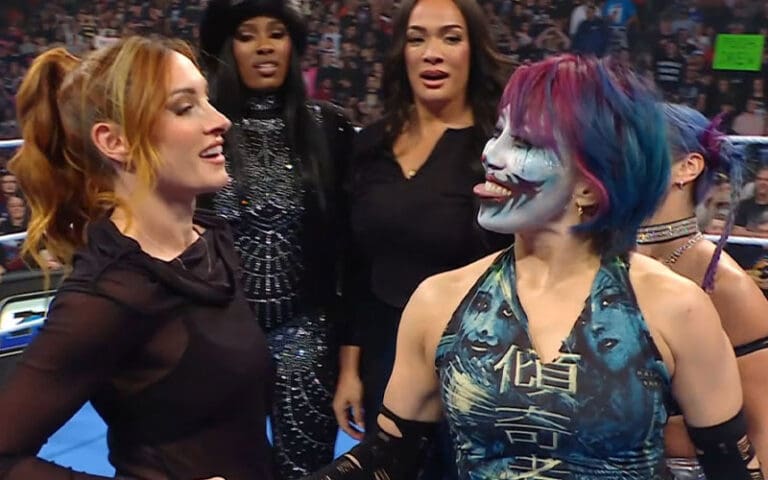 Becky Lynch Blindsides AJ Lee After Getting Added To Women's WarGames Match During 11/21 WWE SmackDown