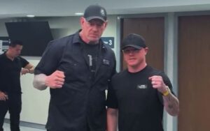 Canelo Alvarez Poses with The Undertaker Backstage at AAA Guerra de Titanes