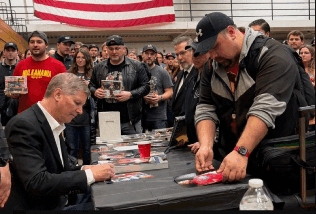 John Laurinaitis Deletes Tweet After Fans Accuse Him of Using AI-Generated Photo