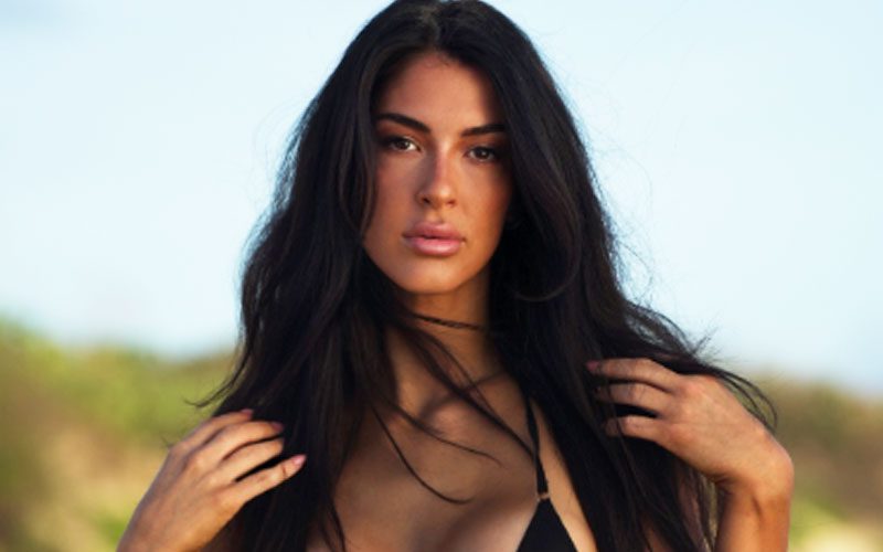 TNA Star Mila Moore Goes Out of Office in Black Bikini Beach Photos